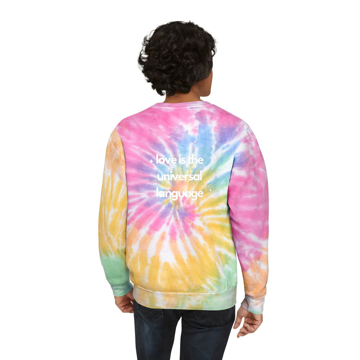 Back view of a man wearing a tie-dye sweatshirt that pairs comfort with a touch of creative wisdom.