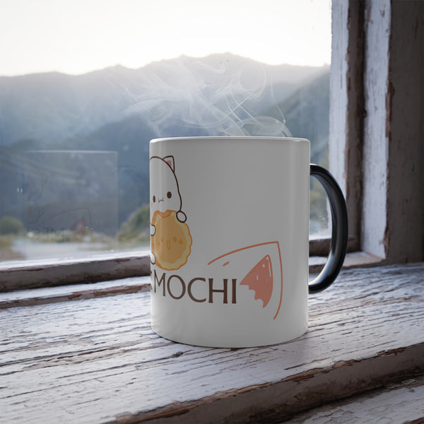 Heat reveal mug with 'Me & Mochi' design transitions as it warms on a rustic window sill. Black ceramic exterior, white interior.