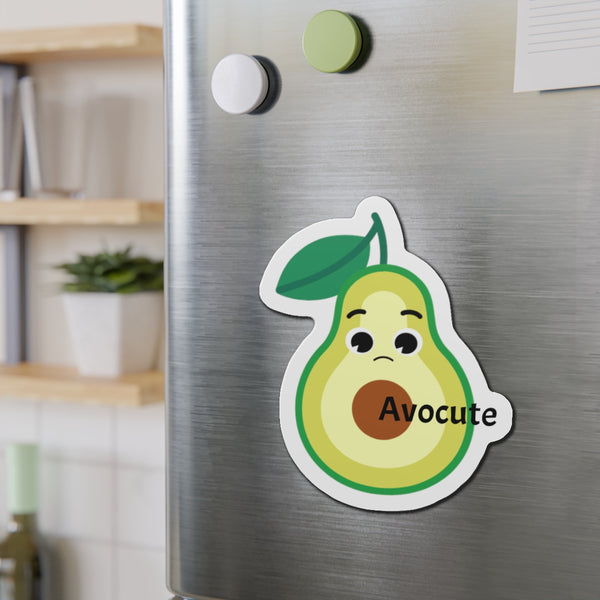 Avocute avocado magnet adorning a metal cupboard, bringing a touch of whimsy to any corner of your home.