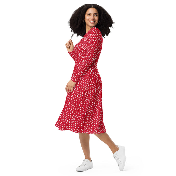 Stylish red polka dot midi dress with a flattering fitted waist and flared skirt, perfect for any casual or sophisticated outing.