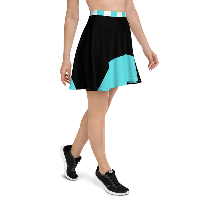 Teenager showcasing the sleek design of a black skater skirt with a comfortable elastic waistband. The skirt hits mid-thigh for versatile styling. 