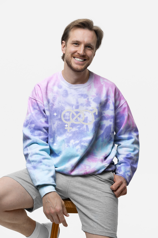 Smiling man wearing a colorful tie-dye sweatshirt, showcasing a mix of vibrant hues and custom design potential.