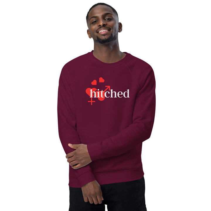 Close-up of the 'Hitched' graphic on the men's organic burgundy sweatshirt. Made with eco-friendly materials for a smaller carbon footprint.