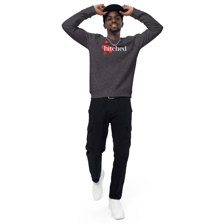 Men's organic raglan sweatshirt in charcoal melange with a playful 'Hitched' graphic. Sustainable fashion with a touch of fun.