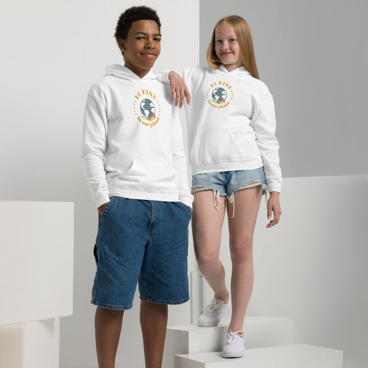 Active kids wearing a white heavy blend hoodie with safety features and spandex cuffs for a comfy fit